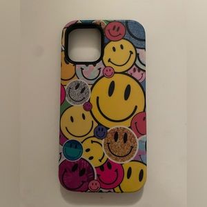CASELY iphone 12 case- smiley stickers. lightly used, good condition.